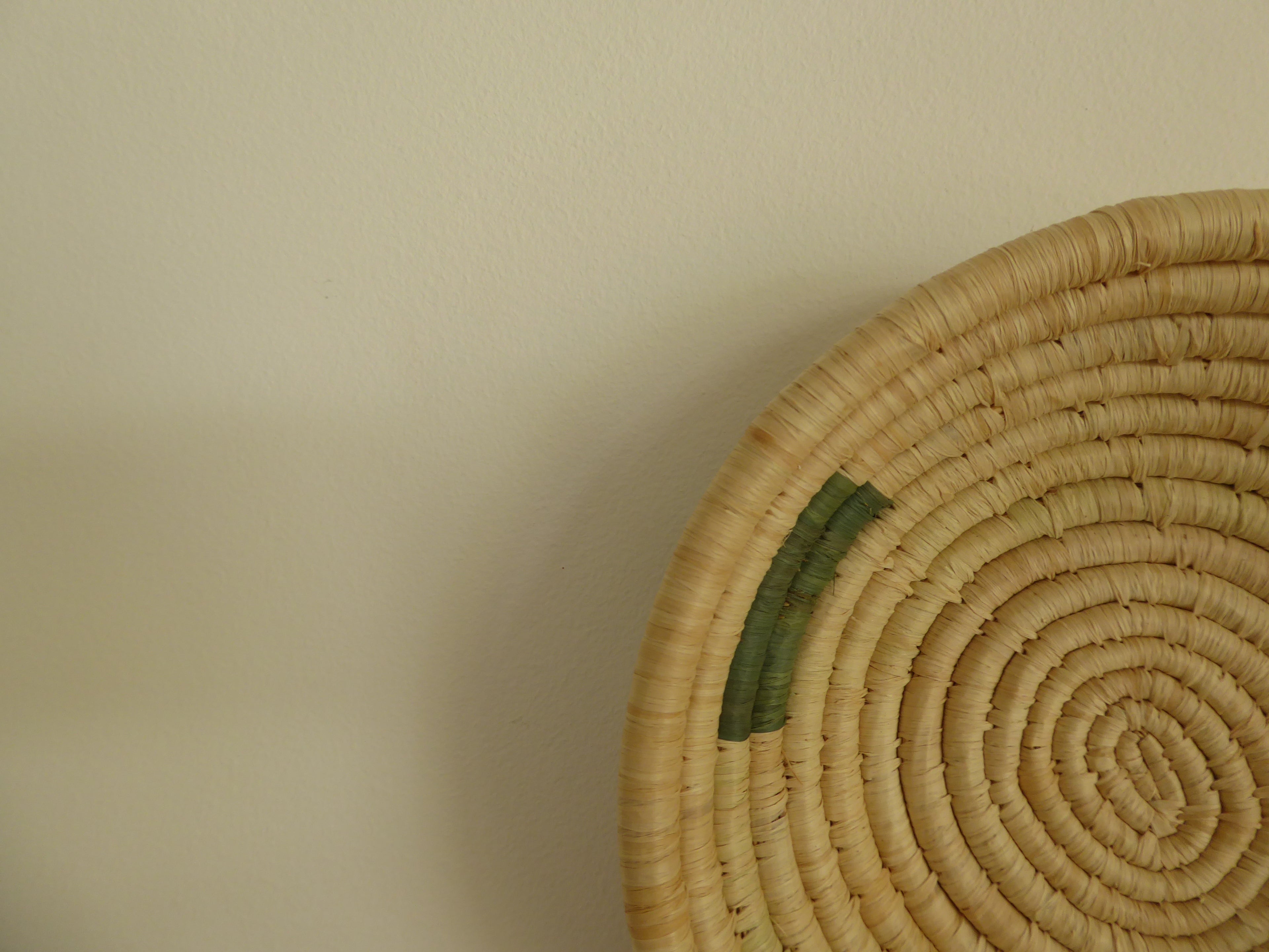 natural and green handcrafted trinket dish bowl against white backdrop